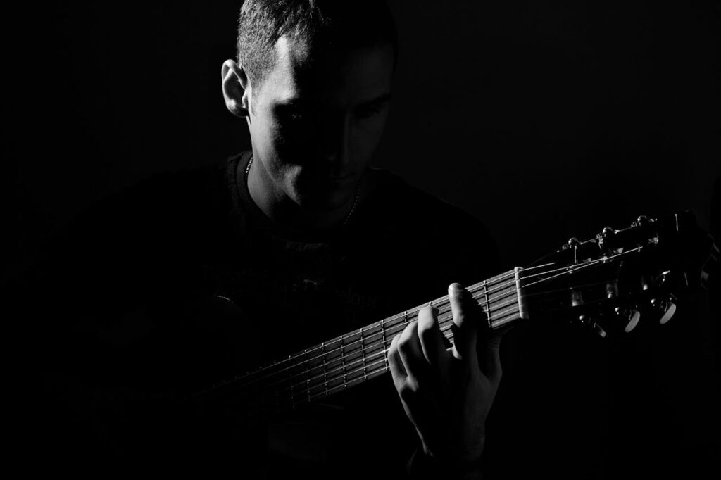 black and white guitar player
